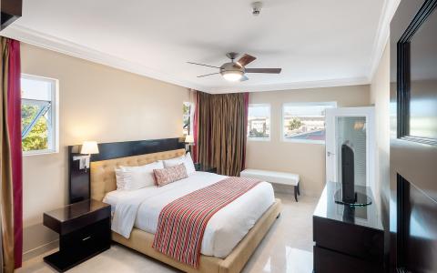 The image shows a neatly arranged hotel room