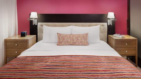 This image shows a modern bedroom setting