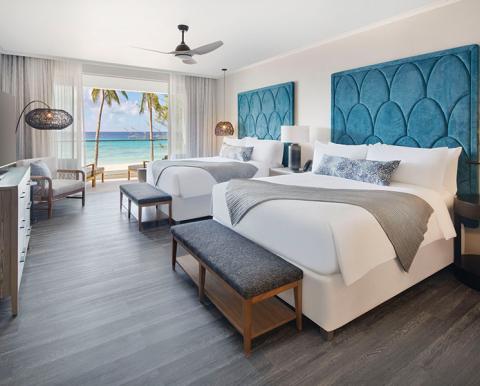 This image features a luxurious and well-designed hotel room