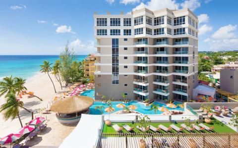 This image showcases a modern beachfront hotel or resort