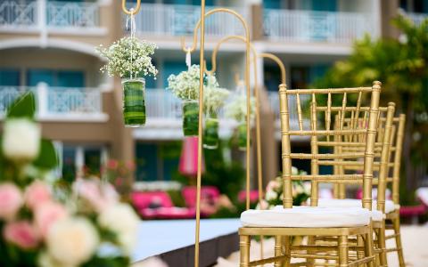This image features an elegant outdoor setting, likely prepared for an event such as a wedding or a formal gathering