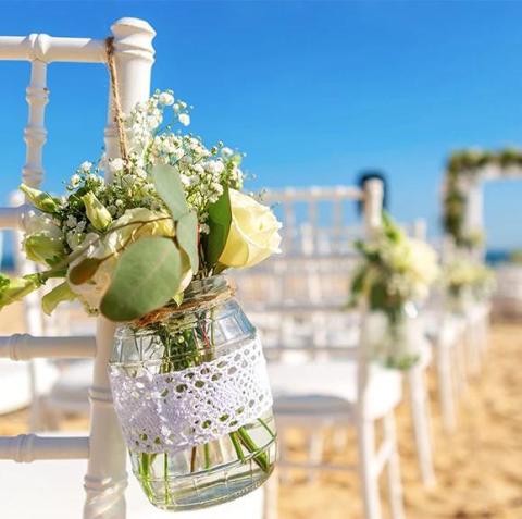 This image features a beach wedding setup