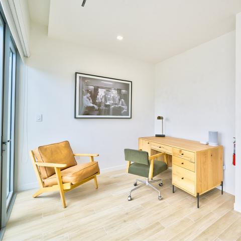 The image shows a modern and minimalist home office setup