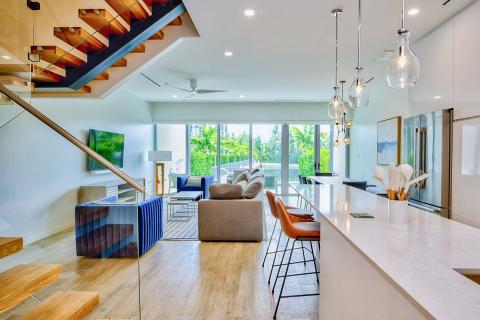The image shows a stylish, contemporary interior of a home