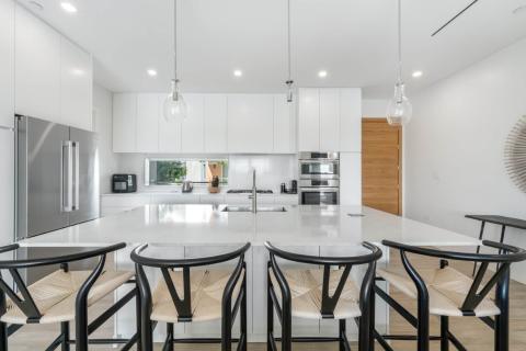 Bright kitchen with high-end appliances