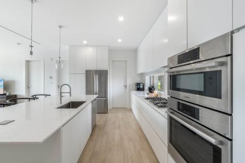 Modern kitchen with white cabinetry