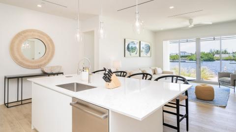 Modern Elegance: Kitchen and Living Space with Scenic Water View