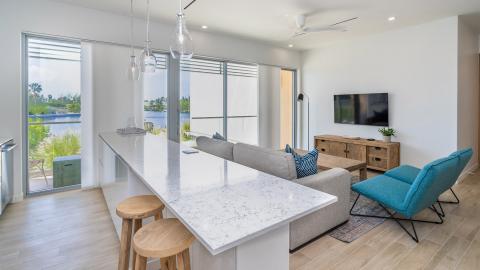 Contemporary Living Room and Kitchen with Lake View
