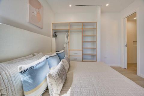 Modern bedroom with upholstered headboard