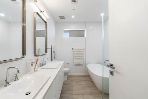 ONE Canal Point: Modern Bathroom with Double Sink Vanity and Freestanding Tub