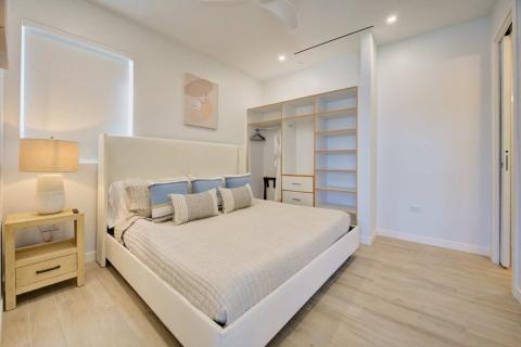 Neatly arranged bedroom with modern art