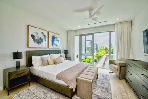 Stylish Modern Bedroom with Double Bed and Tropical Landscape View