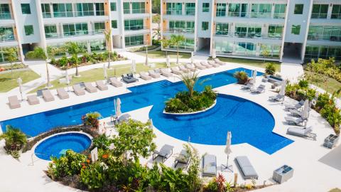 Luxurious Outdoor Pool Area at Modern Residential Building