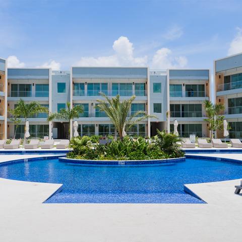 This image shows a luxurious modern resort or hotel complex