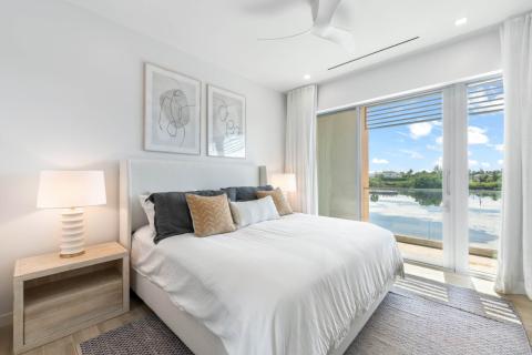 ONE Canal Point: Bright Bedroom with Scenic Water Views