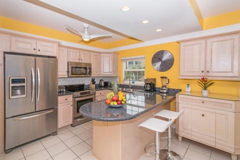 Modern kitchen with yellow walls