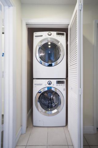 Stackable washer dryer in closet  