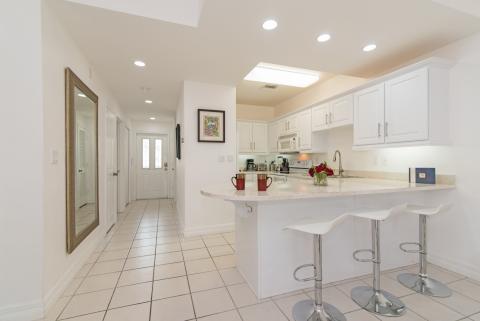 Modern white kitchen with appliances