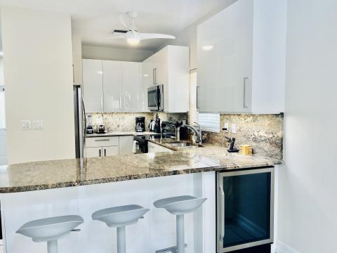 Modern kitchen with white cabinets