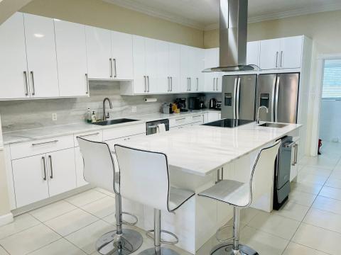Alt Tag: Modern white themed kitchen interior