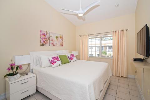 Bedroom with floral bedspread art
