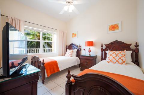 Bright bedroom with two beds  