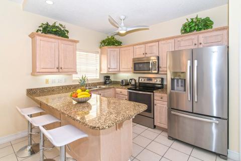   Modern Kitchen with Stainless Steel Appliances and Granite Countertops