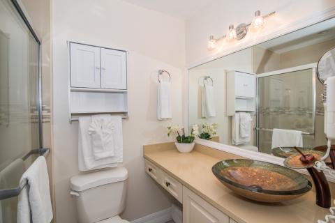 Bathroom with large mirror sink