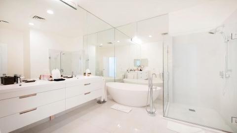 Spacious modern bathroom with amenities