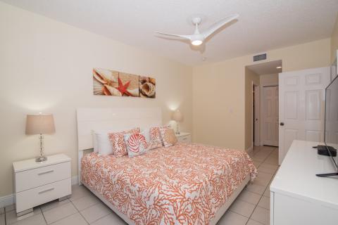 Coastal themed bedroom with coral