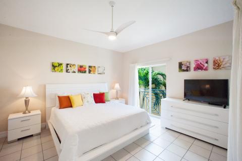 Bright neatly decorated bedroom view