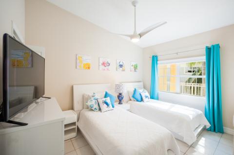 Vibrant twin bedroom with decor  