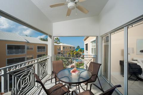 "Well-furnished balcony with table"