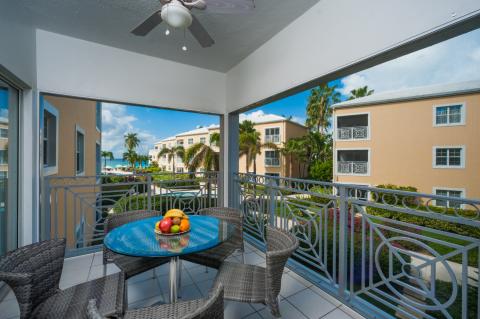 Tropical balcony with wicker chairs