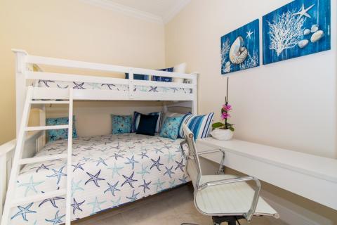 Neatly arranged maritime theme bedroom