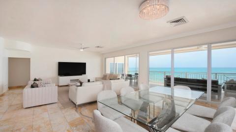 Modern living room with beachfront view