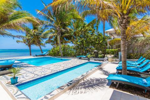 Luxurious pool with lounge chairs  