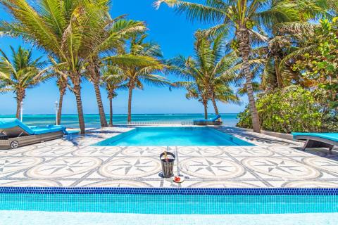  Tropical pool with palm trees