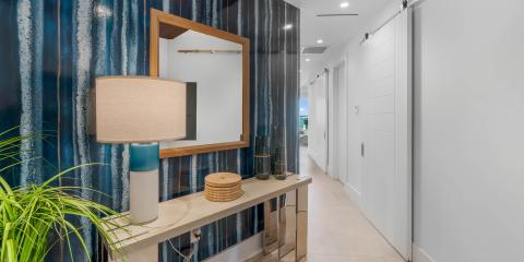 This image features a modern and stylish interior hallway
