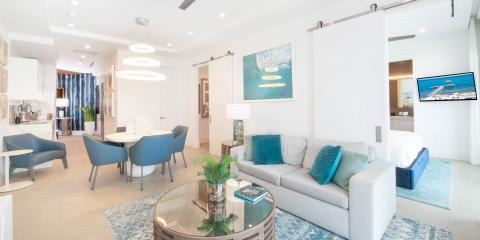 The image shows a modern and brightly lit apartment interior