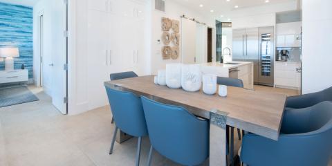 The image shows a modern kitchen and dining area