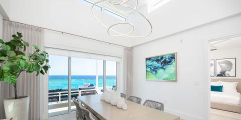 This image showcases a modern and brightly lit interior of a coastal home