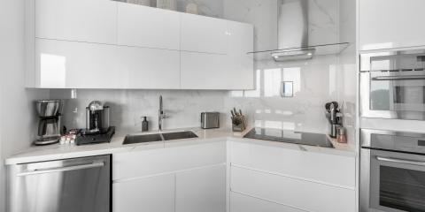 This image shows a modern kitchen interior featuring a clean and sleek design