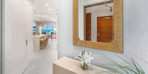 This image shows a modern, well-lit entry area inside a residential space