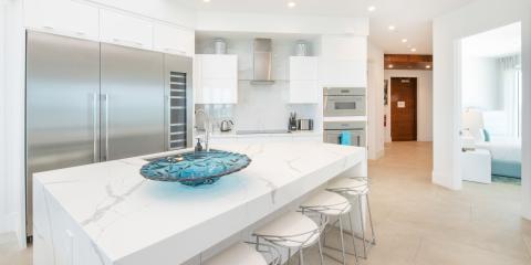 The image shows a modern kitchen with a clean, sleek design