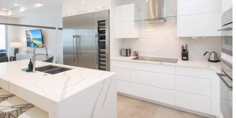 This image depicts a modern kitchen interior with a minimalist design