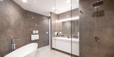 This image features a modern bathroom interior