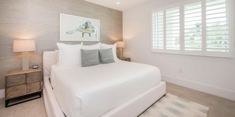 This image shows a modern and neatly arranged bedroom