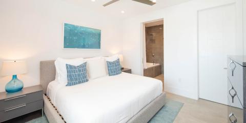 This image shows a modern and neatly arranged bedroom
