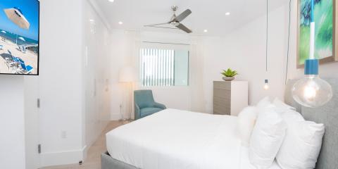This image shows a modern and neatly arranged bedroom
